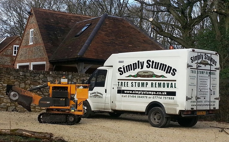 Photo showing the the Simply Stumps Van and stump grinding machine all ready to start work.